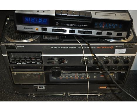 A Hitachi TV FM MW?LW stereo radio cassette recorder along with a Waltham Stereo Cassette recorder and electronic digital clo