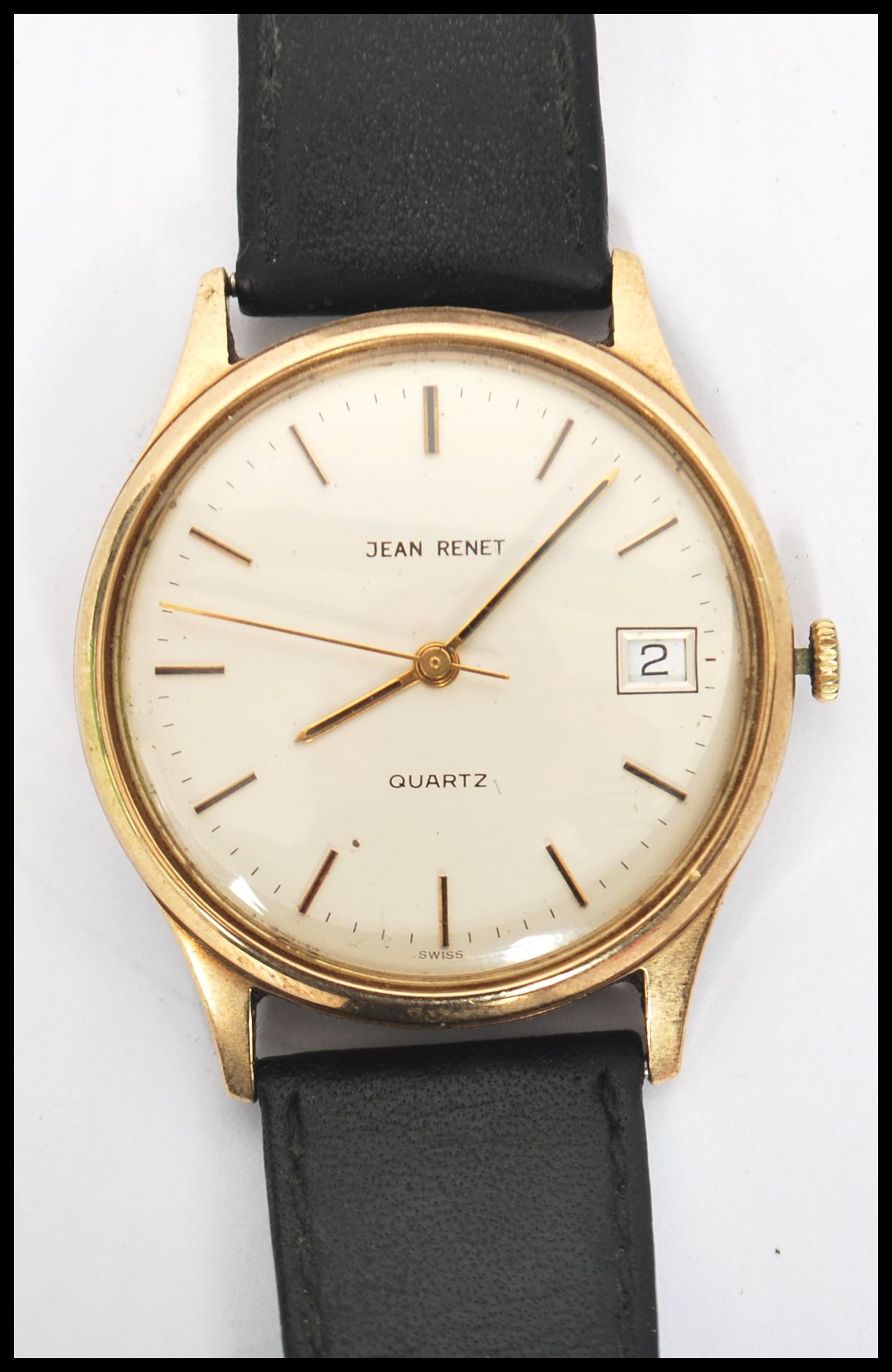 A hallmarked 9ct gold Jean Renet wristwatch. The circular silvered dial ...