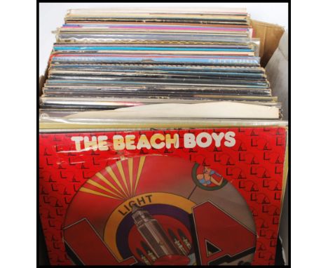 A collection of long play vinyl LP records featurig several artists to include Michael Jackson, The Beach Boys - Light Album 