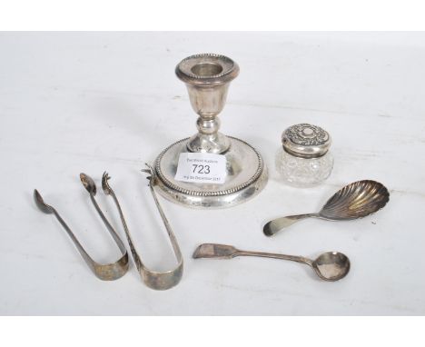 A hallmarked silver stub candle stick of larger form having a gadrooned circular base along with silver hallmarked topped cut