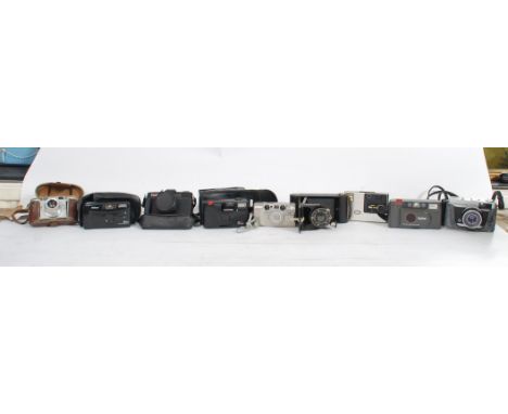 A collection of vintage 20th century cameras to include Paxette, Vivitar, Kodak folding camera Nikon etc.