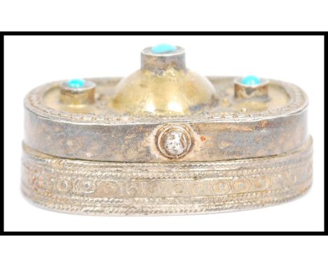 A vintage Kazakhstan silver gilt and Carnelian snuff box from Russian central Asia, fitted with a hinged gilt decorated lid, 