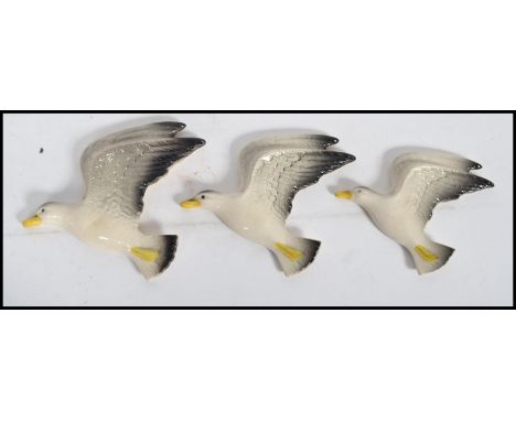 A group of three graduating ceramic wall plaques modelled as seagulls in flight impressed mark to the verso for England possi