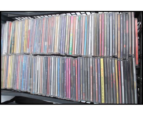 A large collection of CD singles and CD albums featuring various artists and genres to include McFly, Sean Kingstown, Boyzone