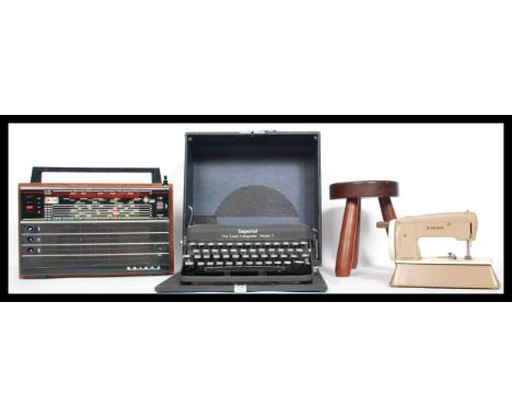 A collection of vintage items to include a cased Imperial reporters typewriter, a teak wood cased Selena radio, a milking sto