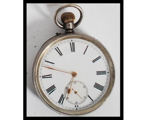 A vintage 20th century silver pocket watch stamped 835 to interior. The enamel face having a roman numeral chapter ring with 