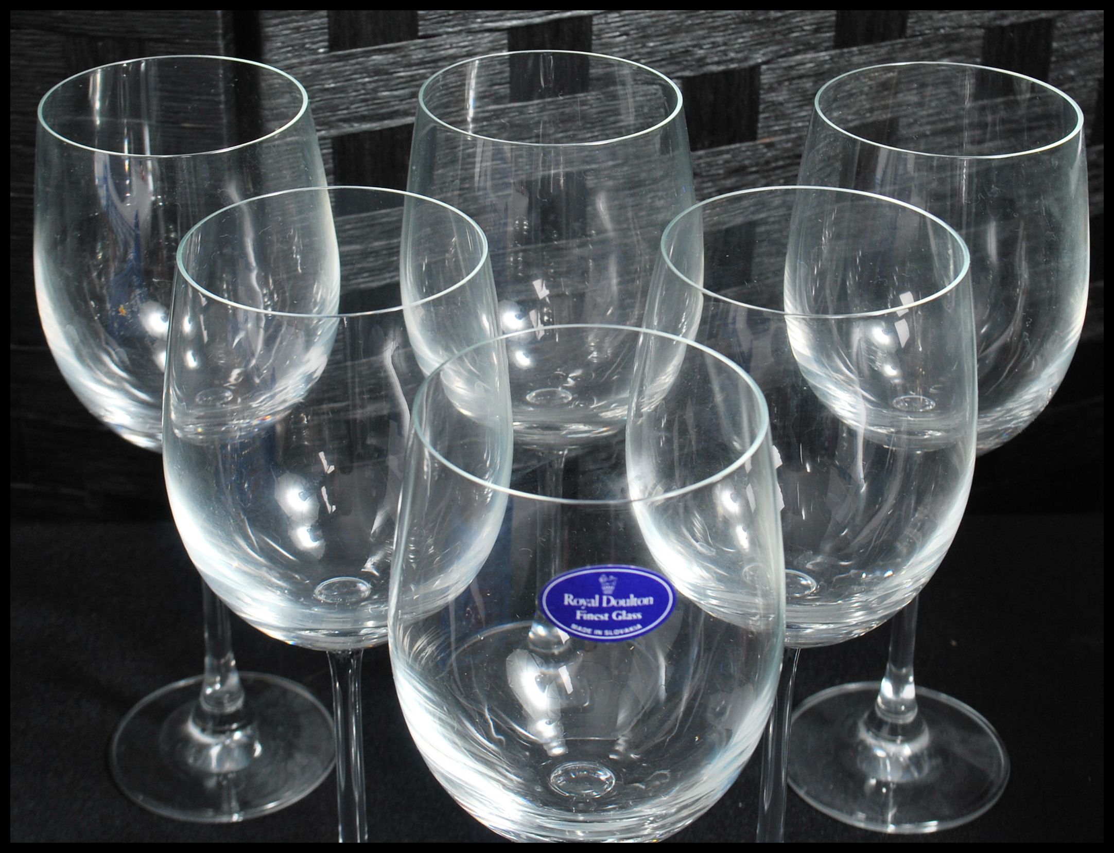 A boxed set of six unused Royal Doulton Finest Glass wine glasses