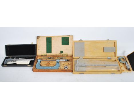 A collection of vintage tools to include engineering tools in case, depth measures, micrometers, boxed Marples clamps, verner
