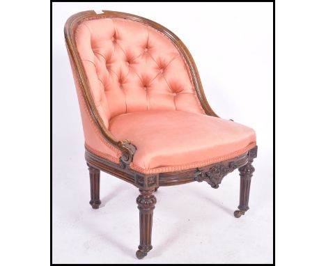 A 19th century Victorian button back bedroom armchair. Of walnut construction with fabulous reeded frame, coral coloured upho