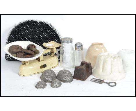A collection of vintage 20th century kitchenalia to include a set of scales with various weights, Victorian ceramic jelly mou
