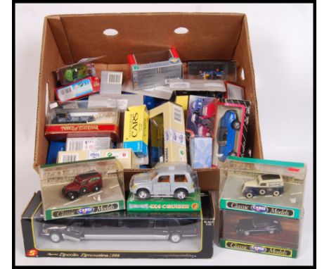 A large collection of various branded assorted diecast model vehicles to include; Sunnyside Lincoln Limousine 1996, Corgi Cla