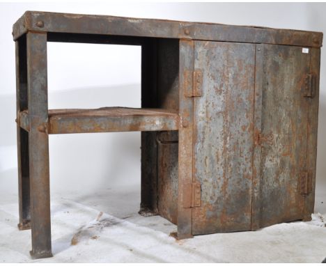 A stunning mid century heavy metal engineers workbench - console sideboard having cast metal framework with metal twin door c