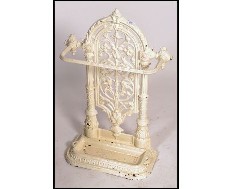 A 19th century Scottish Victorian cast iron stick stand, from the Carron Iron Works, Falkirk, with ornate decoration and inse