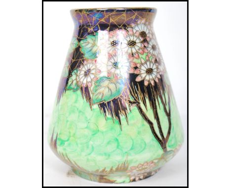 A vintage early 20th century Art Deco Maling ceramic vase in the Daisy pattern. The vase having a green ground with black and