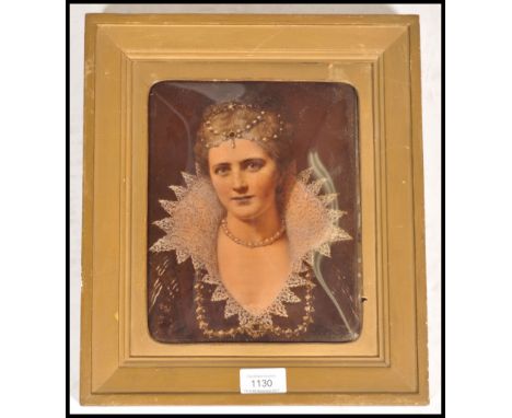 A 19th century reverse oil painting on glass portrait study of a young lady in period dress, The glass set within nice gilt f