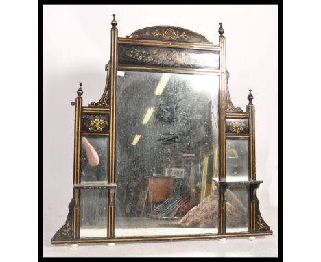 A large 19th century Victorian Aesthetic movement over mantel mirror having an ebonised ground with painted floral sprays. Ra