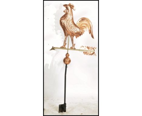 A large 20th century copper and wrought metal iron weather vane. The copper weather vane in the form of a cockerel