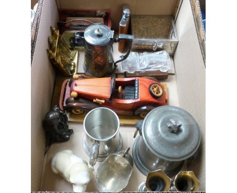 A box of collectibles including model cars, jewellery box, hip flask, die cast, brass tea caddy, dog figures, a pair of plate