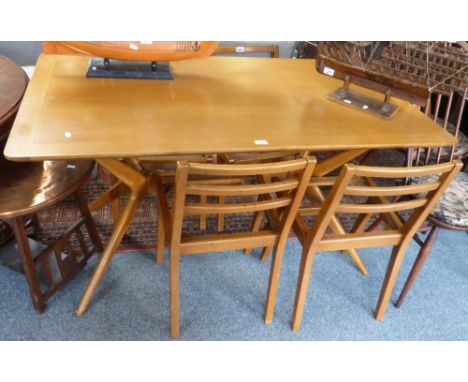 A 1960's mahogany dining table of oblong form, 138cm long, and set of four ladder back chair frames (5)