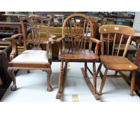 A reproduction Chippendale style mahogany child's armchair, a child's rocking wheelback arm chair and a child's stick back ch