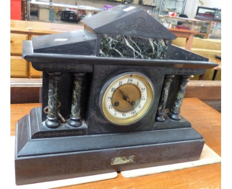 A Victorian black slate and marble architectural style mantle clock, 44cm