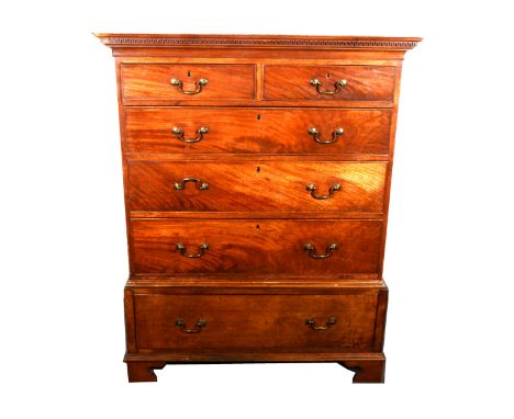 A Georgian mahogany chest of drawers, adapted, dentil cornice, fitted with two short and three long drawers, over a separate 