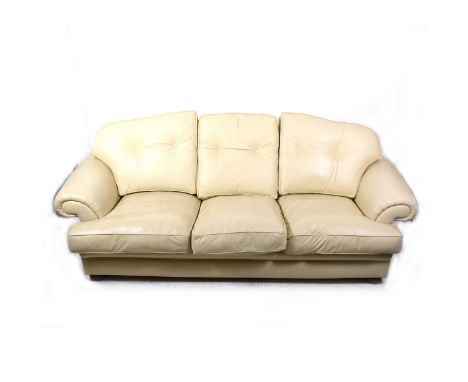 A contemporary cream coloured leather three-seat sofa, length 255cm, depth 107cm.