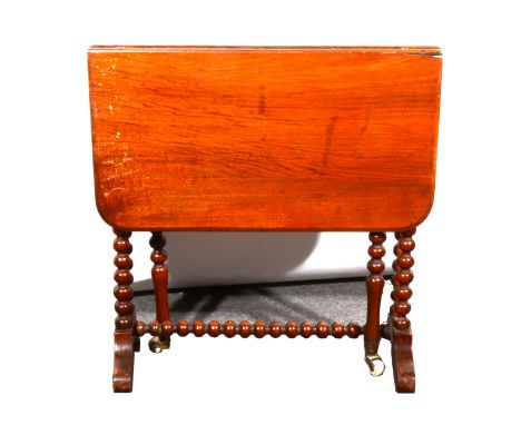 An Edwardian walnut Sutherland table, bobbin-turned supports, standard ends, 51cm x 64cm.