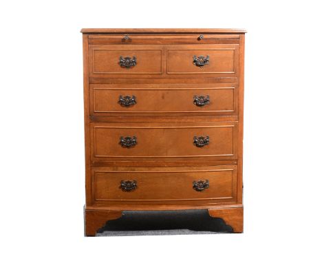 A reproduction mahogany small bowfront chest, with slide above four long drawers, the top drawer with dummy facia, bracket fe