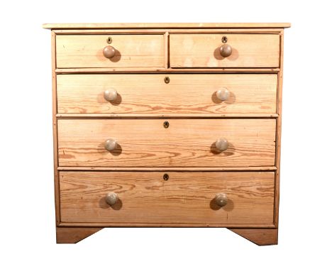 A stripped pine chest of drawers, two short above three long drawers, turned pulls, bracket feet, width 109cm, depth 50cm, he