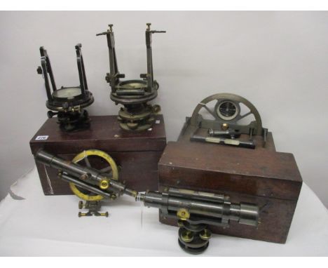 Early 20th century surveyors equipment to include a J White, Glasgow Theodolite, a matching level, an earlier theodolite and 