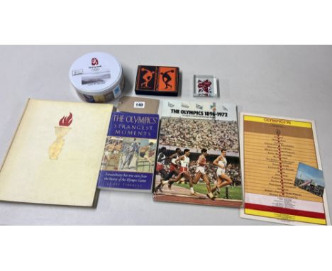 A collection of Olympic interest, books and memorabilia to include a boxed set of 'Commemorative Olympic Playing Cards', a 'B