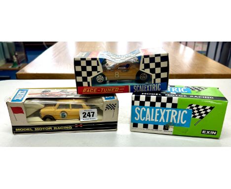 Scalextric 3 boxed models, including Tri-ang Mini, Race-tuned model, etc.