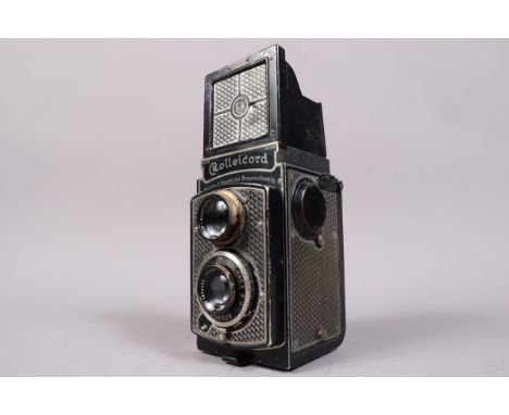 A Rolleicord I Nickel-Plated TLR Camera, serial no on lens 1479033, shutter sluggish on slow speeds, body G, brassing on filt