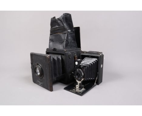 Two Houghtons Ensign Quarter Plate Cameras, an Ensign Popular Reflex, body F, heavy scuffing, shutter firing, dim image visib