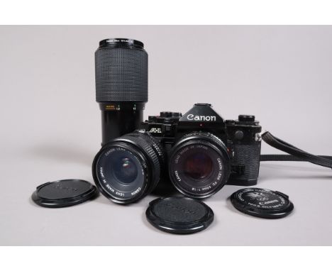 A Canon A-1 SLR Camera Outfit, serial no 2061387, shutter working, meter responds to light, -4 dioptre eyepiece correction le