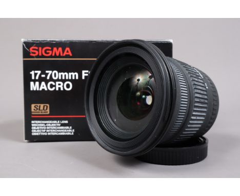 A Sigma DC 17-70mm f/2.8-4.5 Macro Lens, Canon EF mount, auto focus functions, barrel G, some fading to grip, elements VG, wi