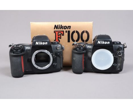 Two Nikon F100 Camera Bodies, both power, shutters working, bodies F-G, both tacky to the touch, one in maker's box, with man