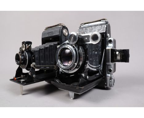 A Zeiss Ikon Super Ikonta C Folding Rangefinder Camera, model 531/2, 6 x 9cm, serial no B11507, body F, paint losses and bubb