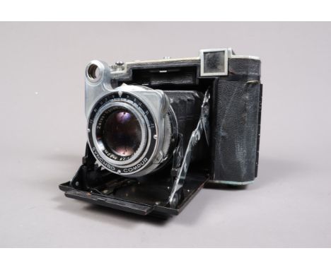 A Zeiss Ikon Super Ikonta B Folding Rangefinder Camera, model 532/16, mid 1950s, serial no T 8865, body F, discoloration, lif