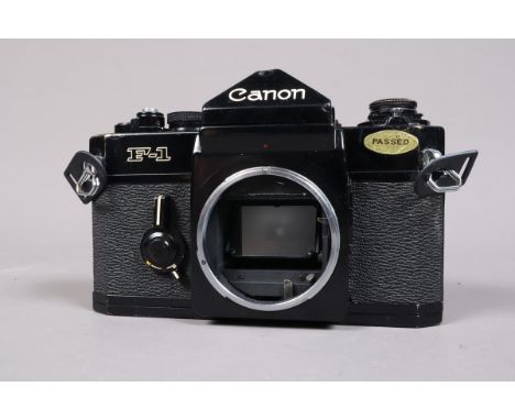 A Canon F-1 Camera Body, original version, serial no 174249, shutter sticking on slow speeds, meter responsive, self timer wo