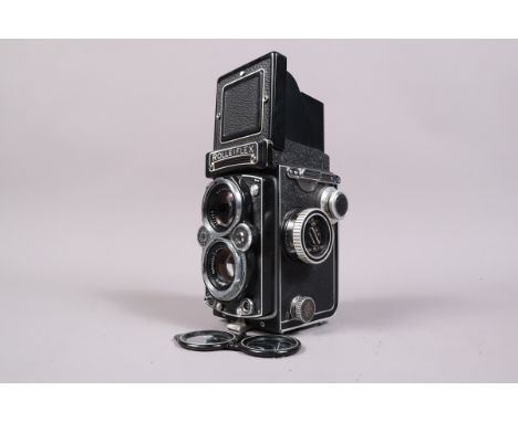 A Rolleiflex 3.5E TLR Camera, serial no 1863170, shutter sticking on slow speeds, body G, some paint scratches to edges, with