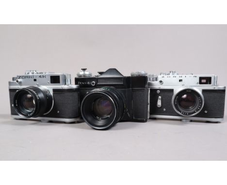 Three Russian Cameras, a Zorki 4 rangefinder camera, body G, shutter working, rangefinder working, a Jupiter-8 50mm f/2 lens,