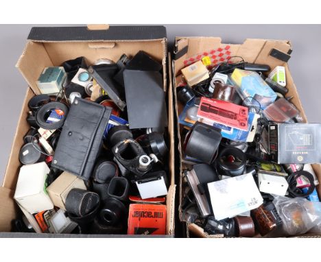 Various Camera Related Accessories, two trays of accessories including filters, lens converters, extension tubes, lens hoods,