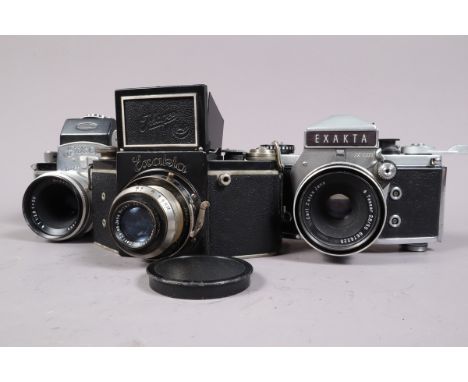 Four Ihagee SLR Cameras, a VP Exakta A Type 4.1 with 2 hole flash sync, a Carl Zeiss Jena Tessar 7.5cm f/3.5 lens, shutter wo