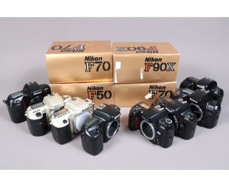 A Tray of Nikon Camera Bodies, five Nikon F50, one in maker's box, four tacky to the touch, other G, two F60, bodies G, four 