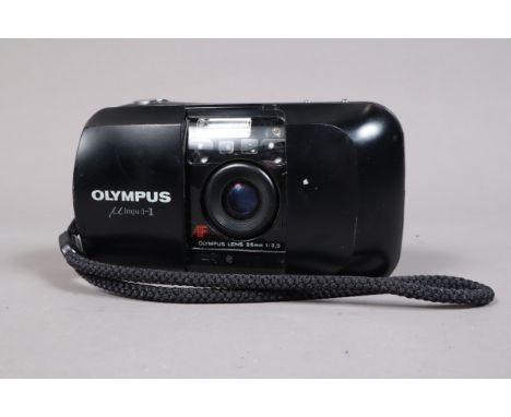 An Olympus mju 1 Compact Camera, powers up, shutter working, flash working, otherwise untested, body G, light scratches, lens