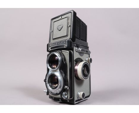 A Rolleiflex T TLR Camera, grey, serial no 2134055, shutter working, shutter button sometimes slow to release, body G-VG, wit