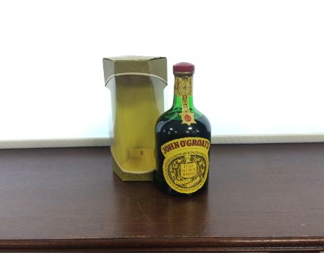 JOHN O'GROATS
Fine Scotch Whisky. 
Produced by The Drambuie Liqueur Co. Ltd. 75cl, 40% volume.  CONDITION REPORT: Fill level 