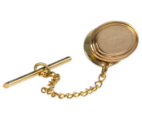 A Gold Tie Pin. Stamped "1R 14 KT". On chain.